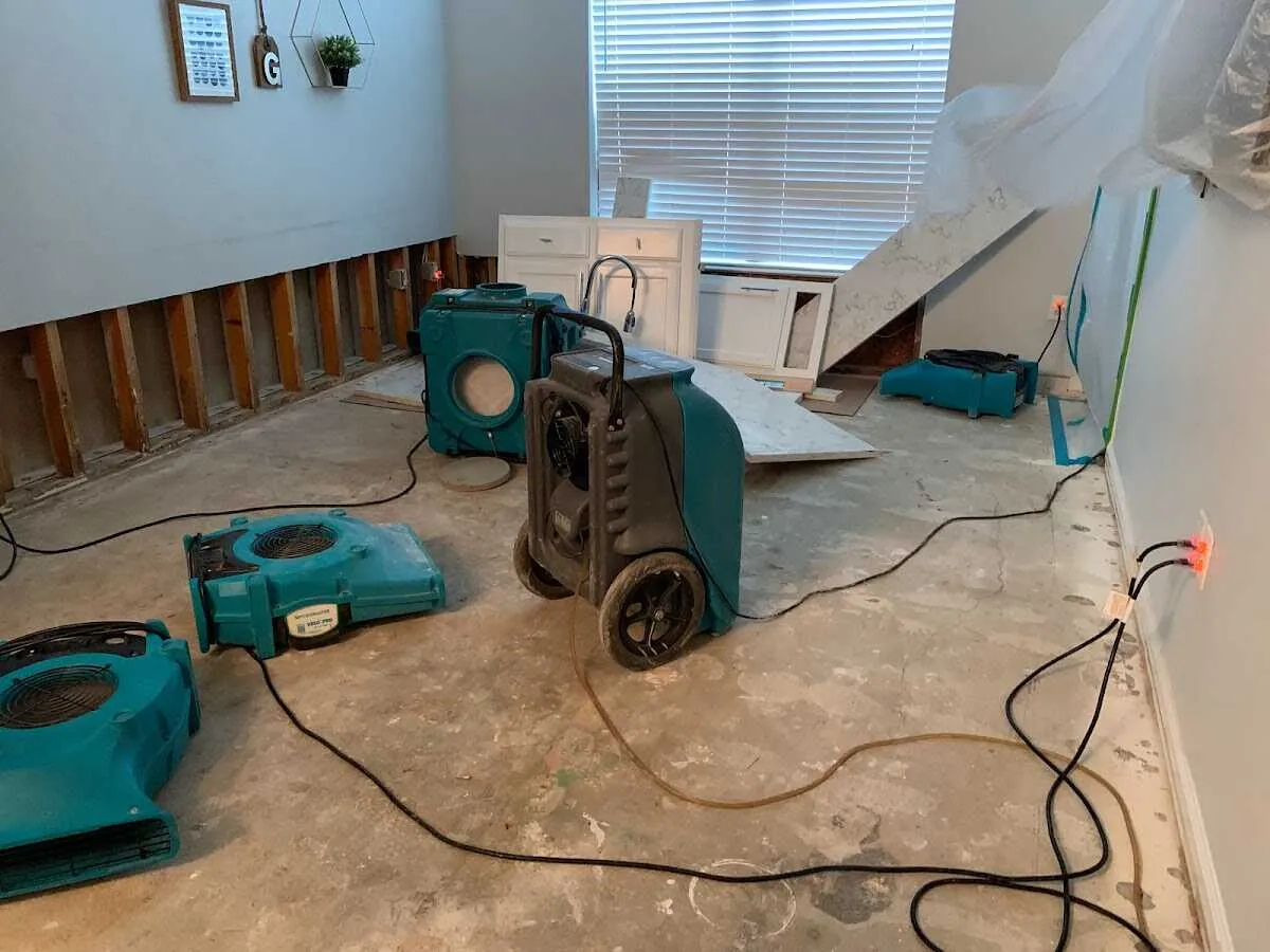 Dehumidifier in flood-cut room for Water Damage Restoration in Arvada